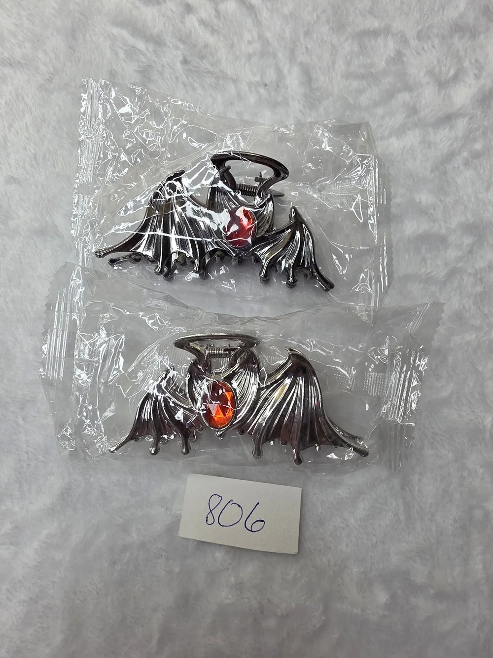 2 Metal Bat Hair Clips With Red Jewel